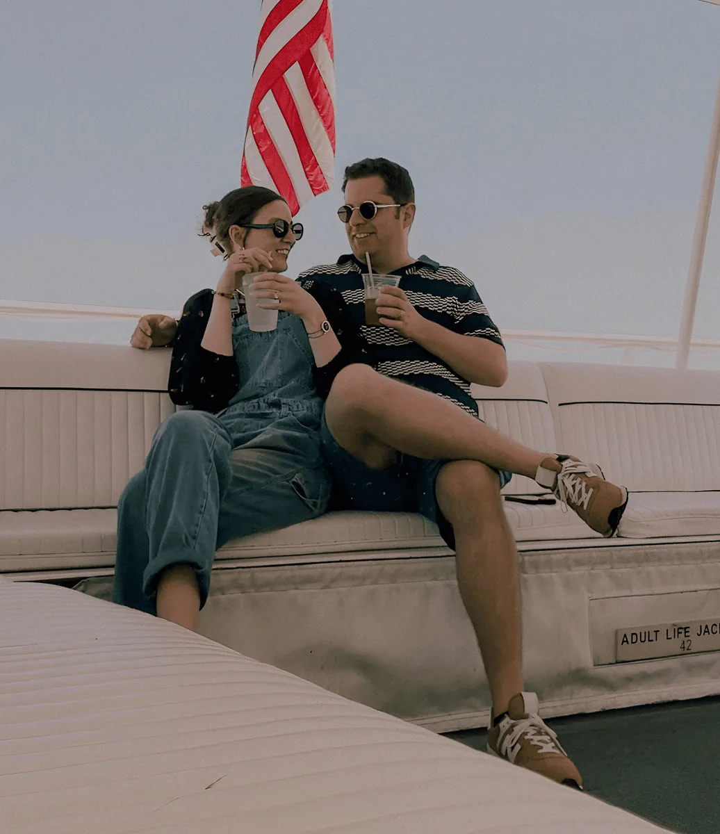 Aaron and his wife on a boat